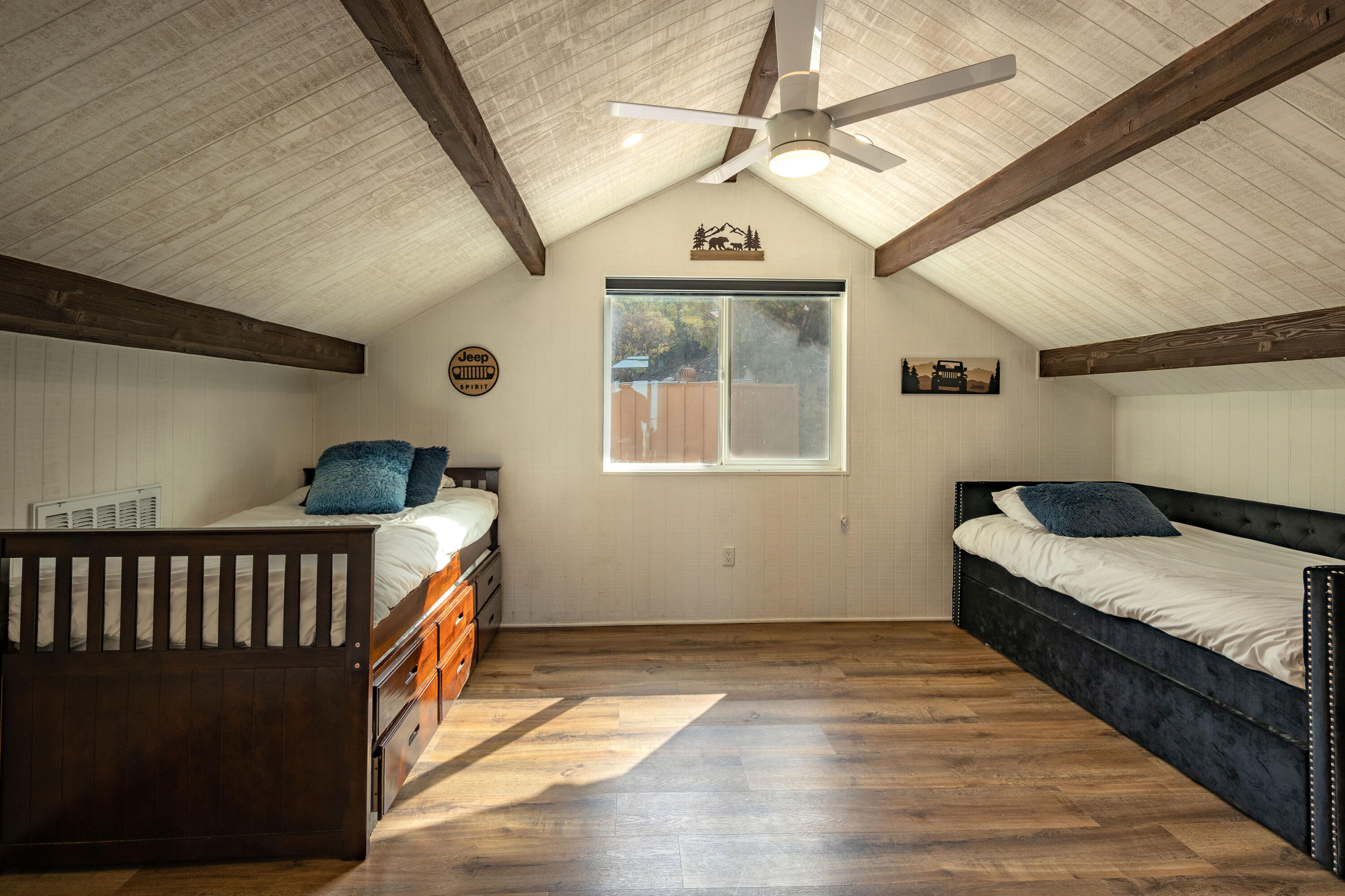 67195 Springcrest Drive Mountain Center, CA 92561 - Photo 61 of 67 a spacious bedroom with a bed and a window