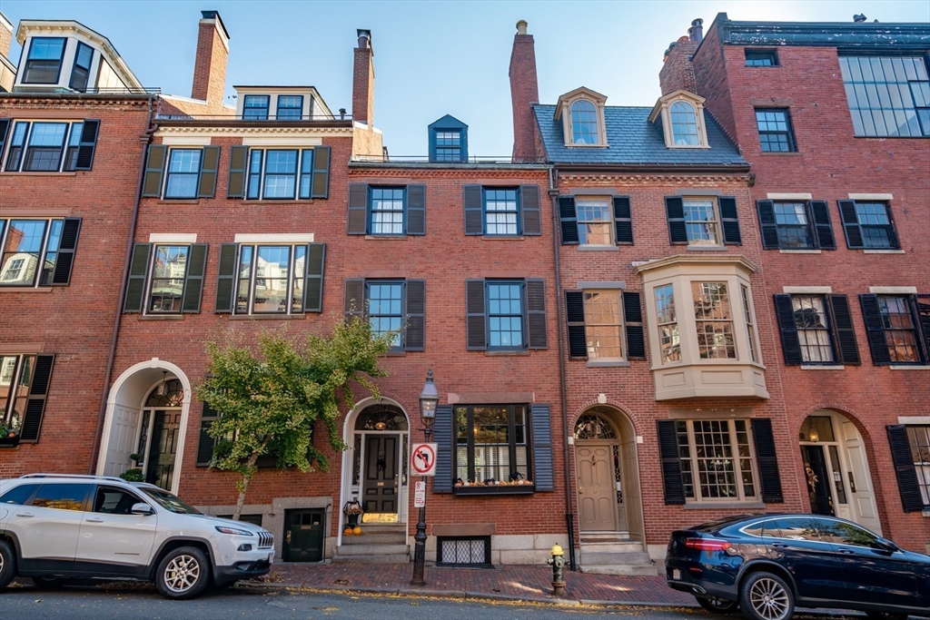 62 Chestnut Street Boston, MA 02108 - Photo 18 of 18 a car parked in front of a building