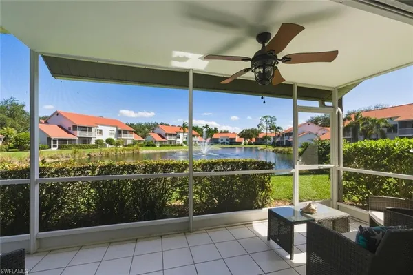 a view of a balcony with chairs