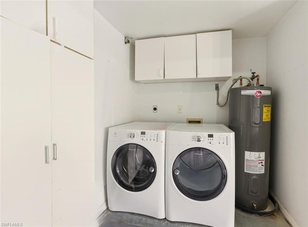 636 Windsor Square, Unit 102 Naples, FL 34104 - Photo 20 of 33 a utility room with dryer and washer