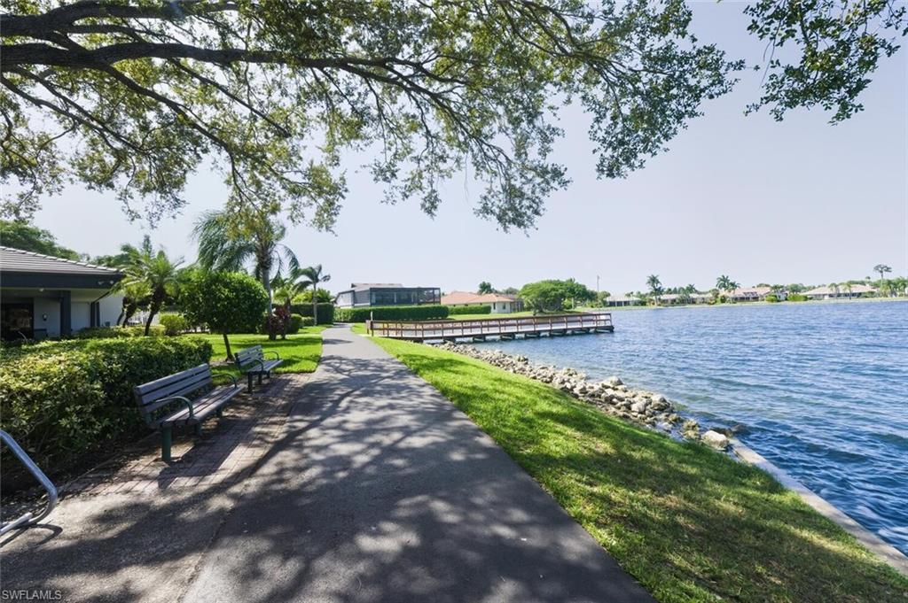 636 Windsor Square, Unit 102 Naples, FL 34104 - Photo 24 of 33 a view of a street with a building in the background