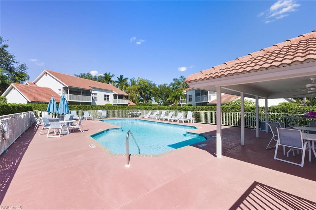 636 Windsor Square, Unit 102 Naples, FL 34104 - Photo 28 of 33 an outdoor space with patio