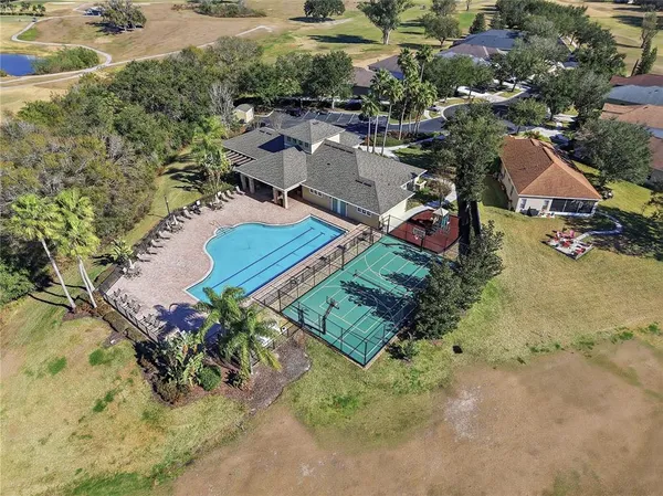 an aerial view of a houses with outdoor space
