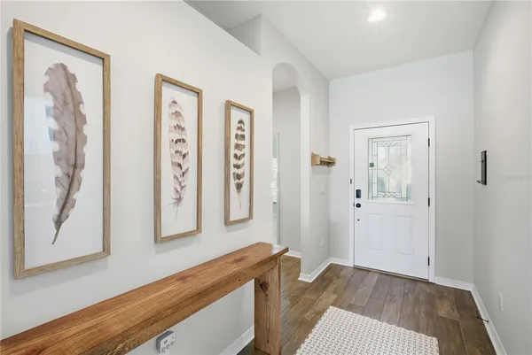 view of room with window and wooden floor