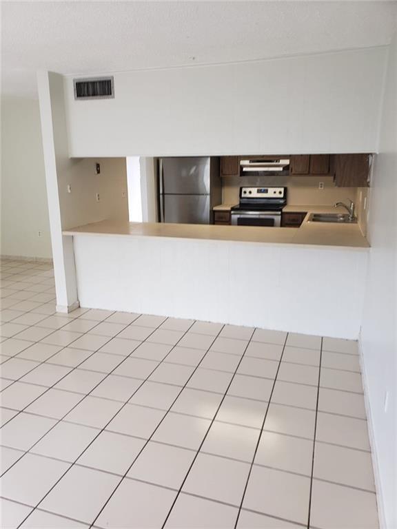 1850 West 72nd Place, Unit 1850 Hialeah, FL 33014 - Photo 3 of 8 a view of workspace