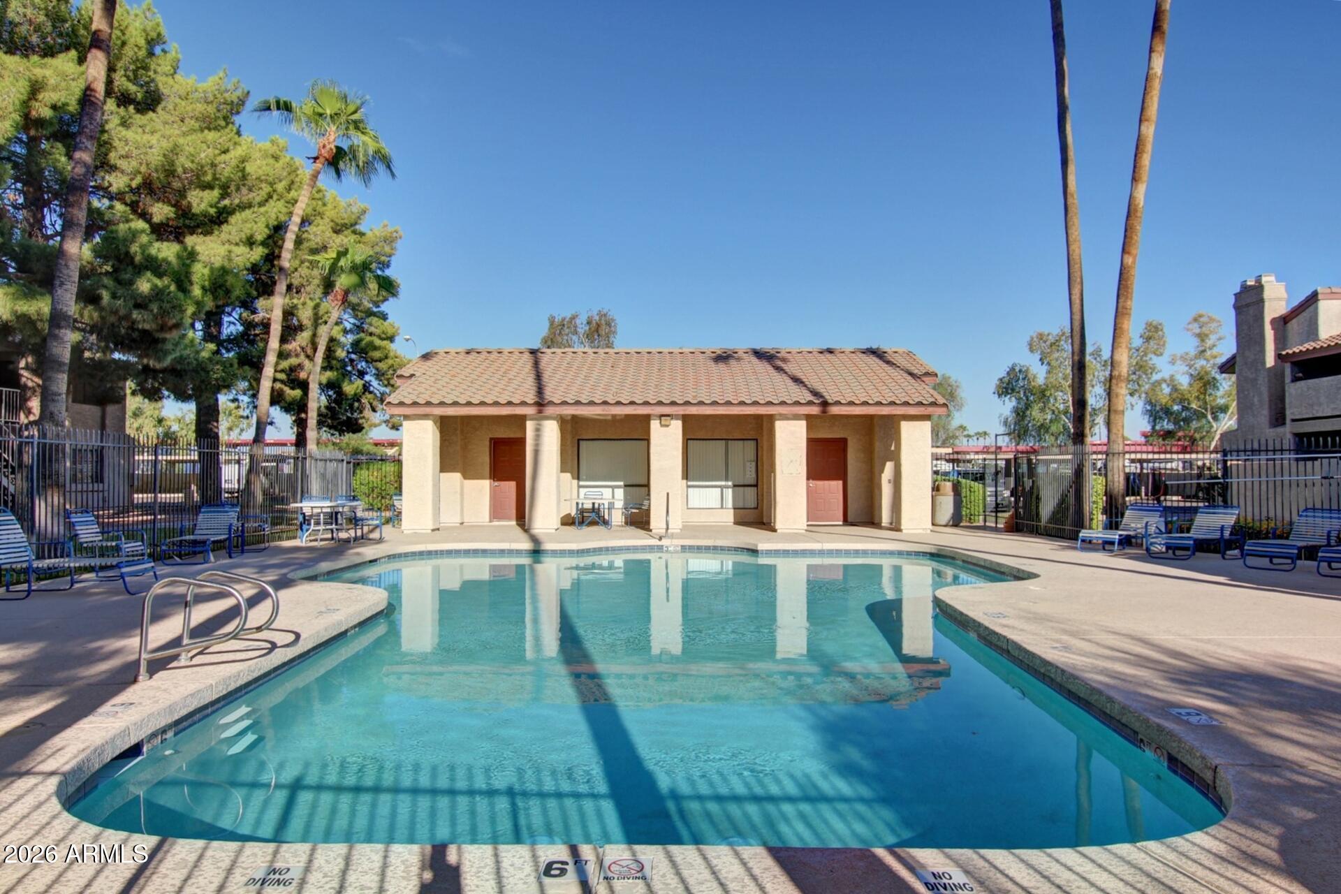 533 West Guadalupe Road, Unit 1104 Mesa, AZ 85210 - Photo 19 of 20 a view of a house with backyard