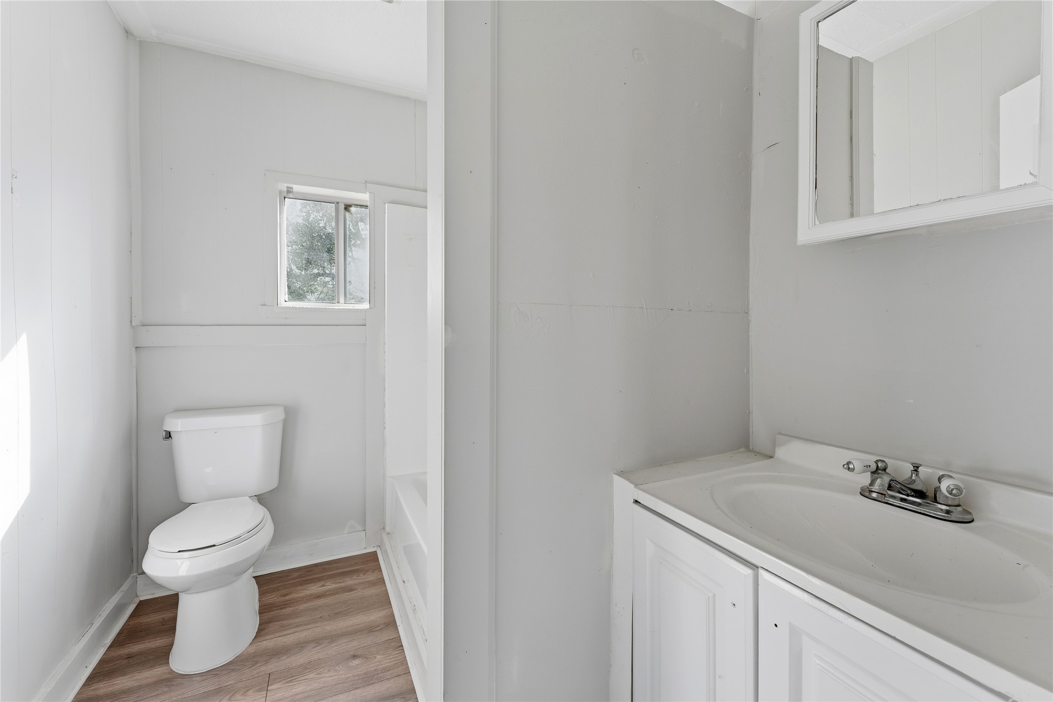 2105 Beaumont Road Baytown, TX 77520 - Photo 14 of 17 a bathroom with a sink and a toilet