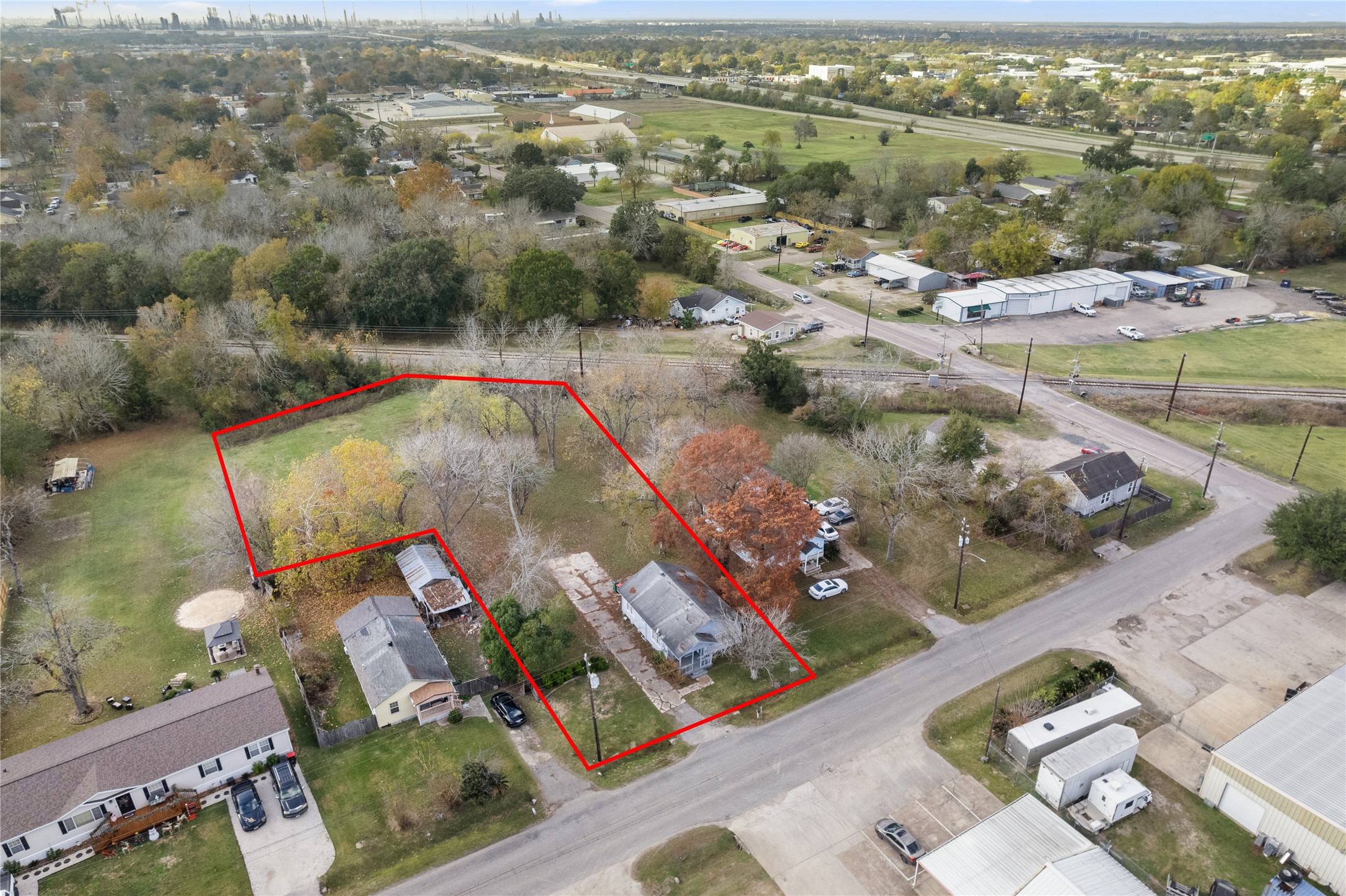 2105 Beaumont Road Baytown, TX 77520 - Photo 16 of 17 an aerial view of a house with a lake view