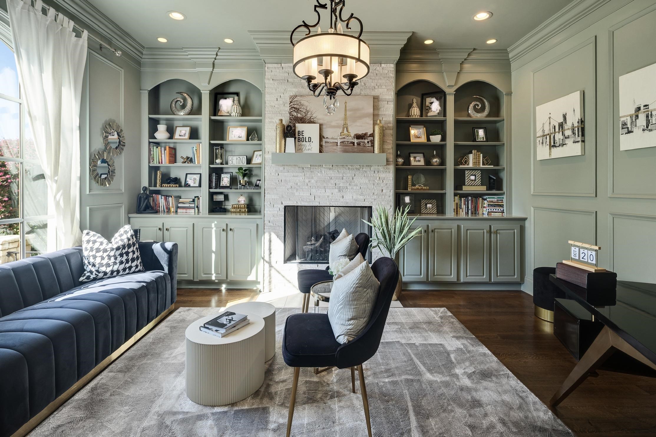 3246 Hollow Creek Road Germantown, TN 38138 - Photo 12 of 40 a living room with furniture chandelier and a fireplace
