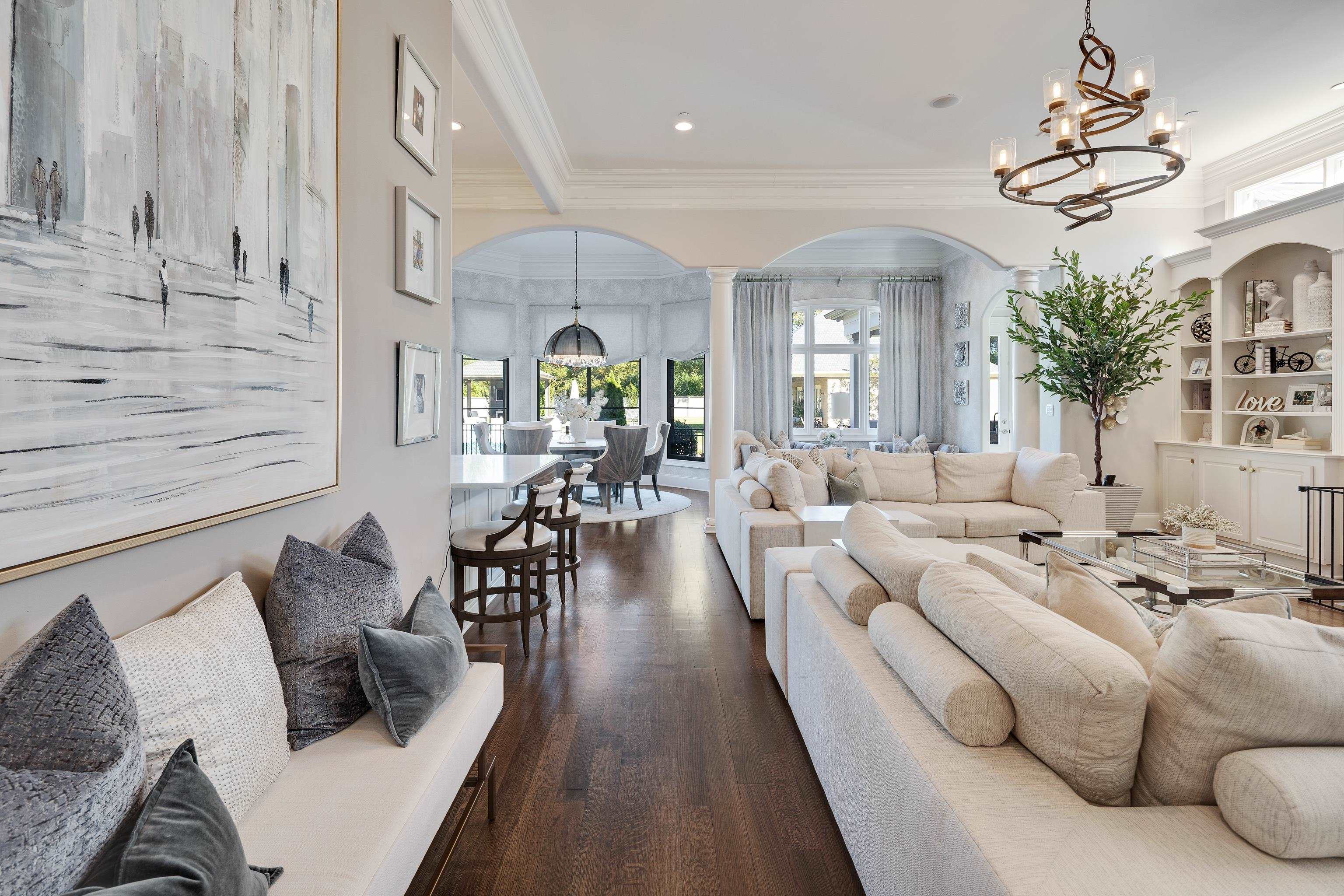 3246 Hollow Creek Road Germantown, TN 38138 - Photo 19 of 40 a living room with furniture and a chandelier
