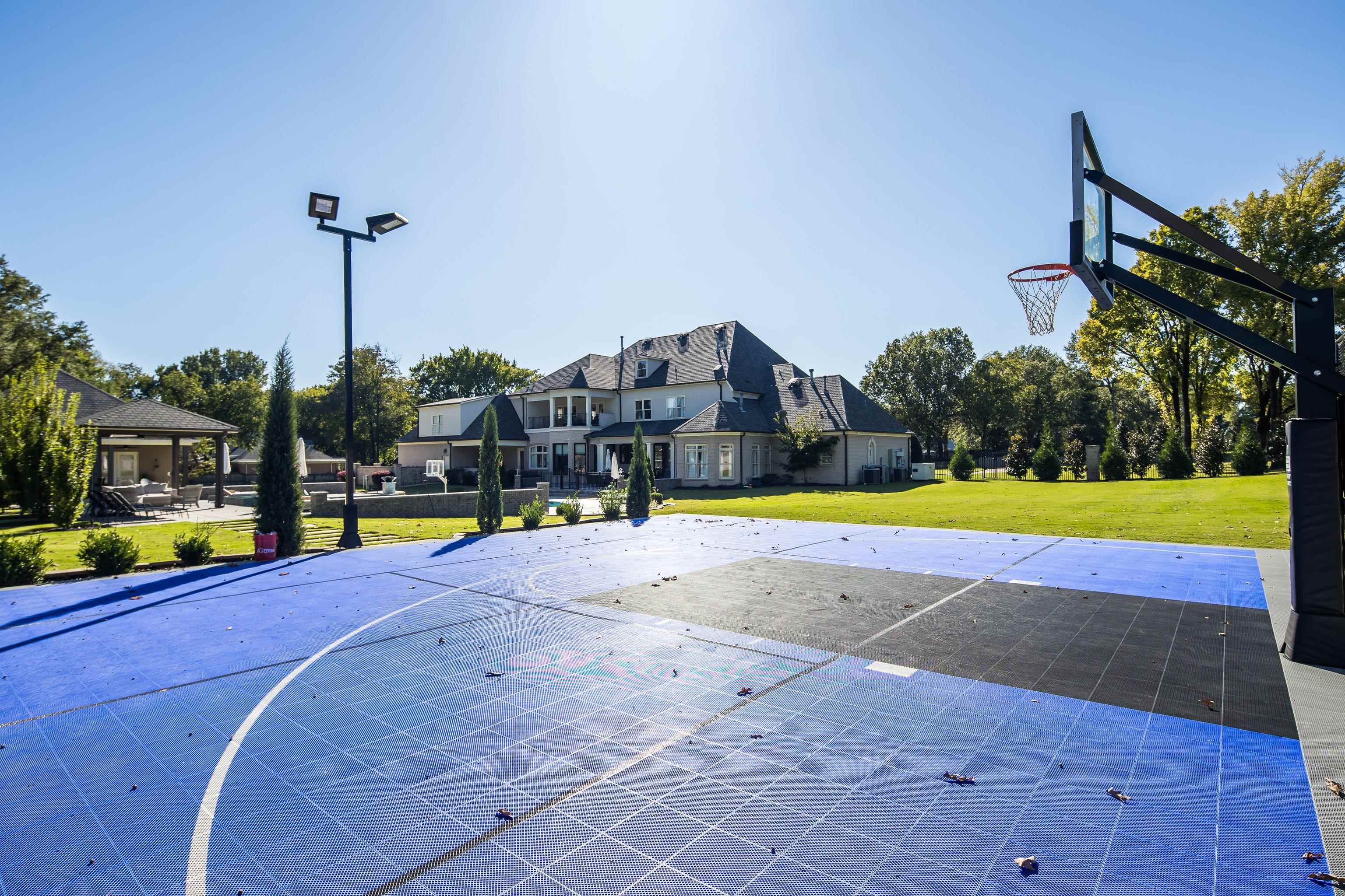 3246 Hollow Creek Road Germantown, TN 38138 - Photo 6 of 40 a view of a swimming pool with an outdoor seating and a yard