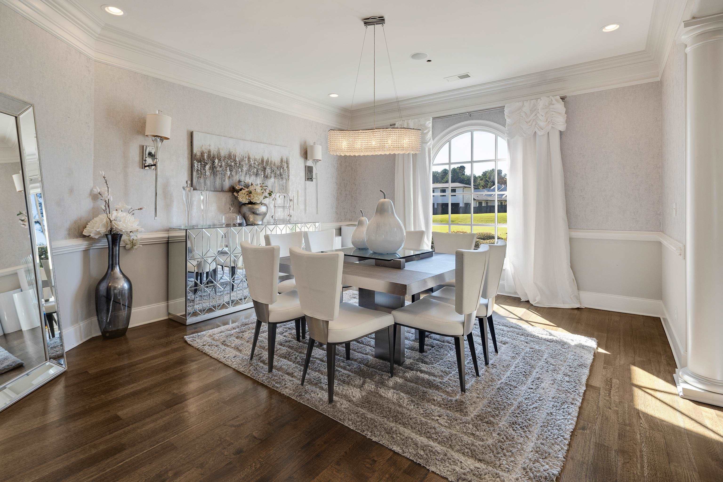 3246 Hollow Creek Road Germantown, TN 38138 - Photo 10 of 40 a dining room with furniture window wooden floor