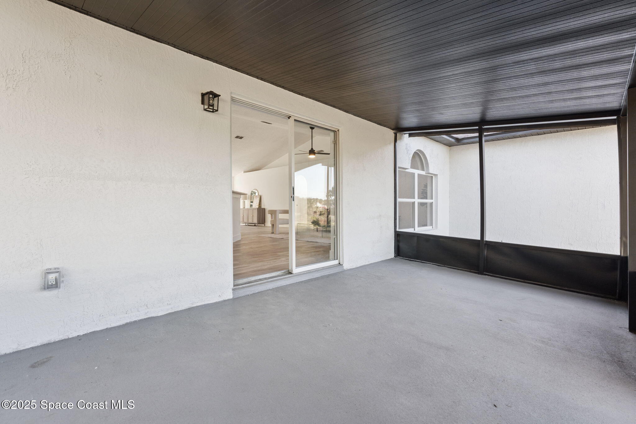 6200 Edison Street Cocoa, FL 32927 - Photo 20 of 21 a view of an empty room with a window