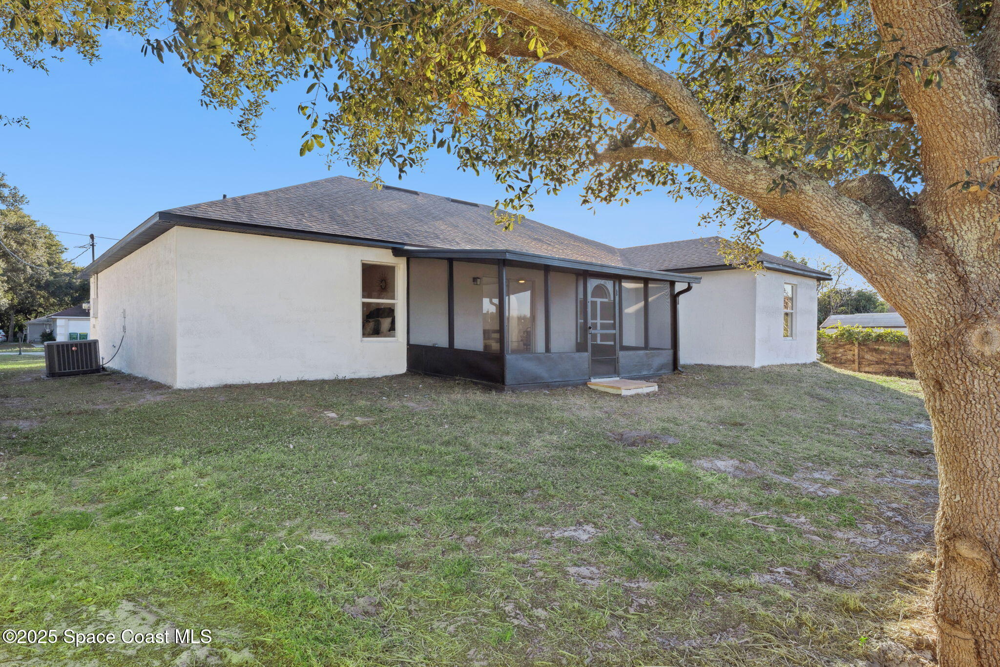 6200 Edison Street Cocoa, FL 32927 - Photo 21 of 21 a view of a house with a yard