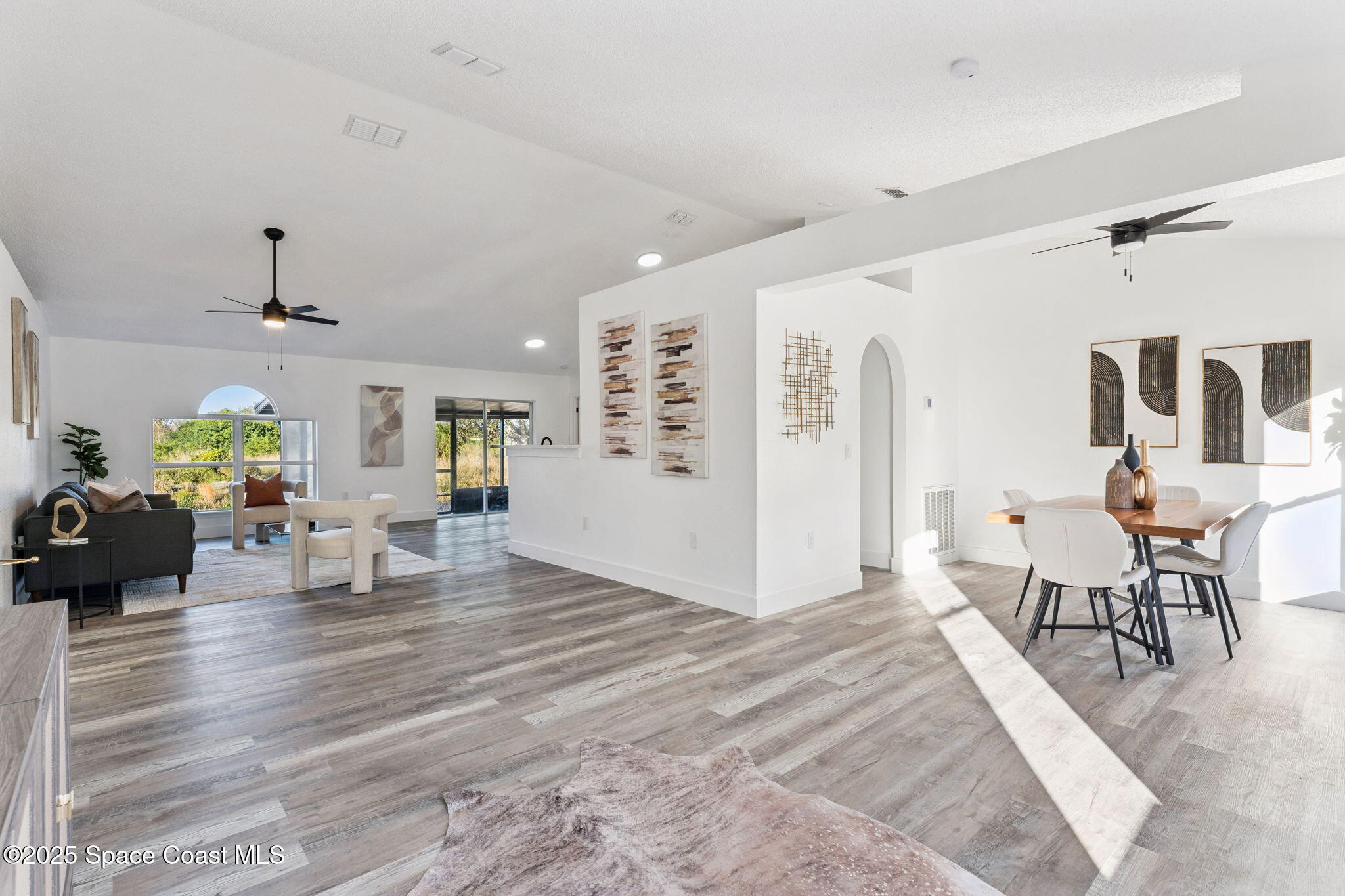 6200 Edison Street Cocoa, FL 32927 - Photo 6 of 21 a living room with furniture and a table