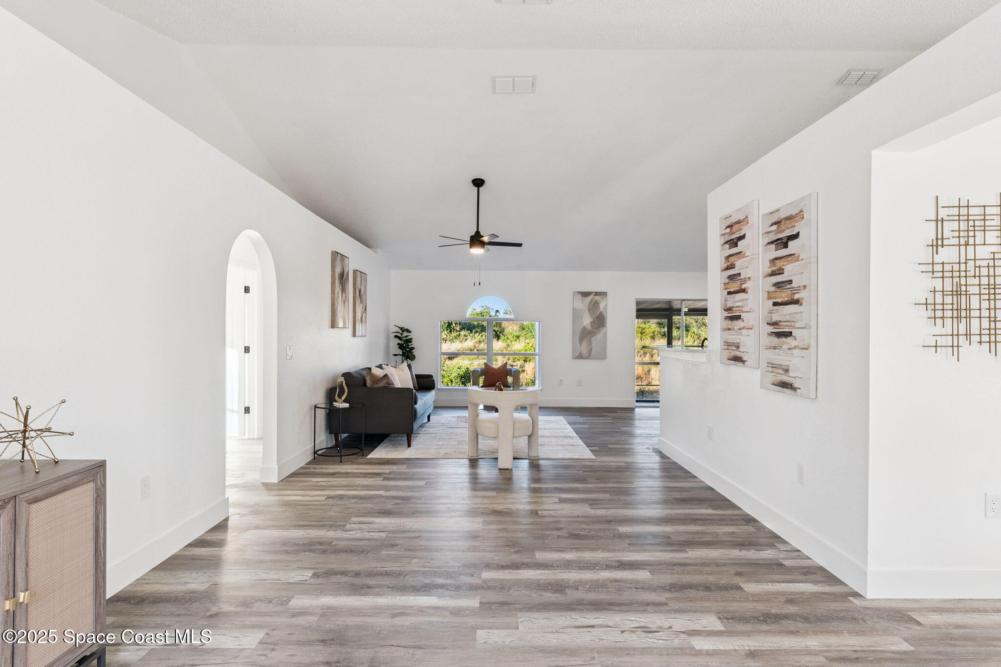 6200 Edison Street Cocoa, FL 32927 - Photo 7 of 21 a view of a living room and dining room