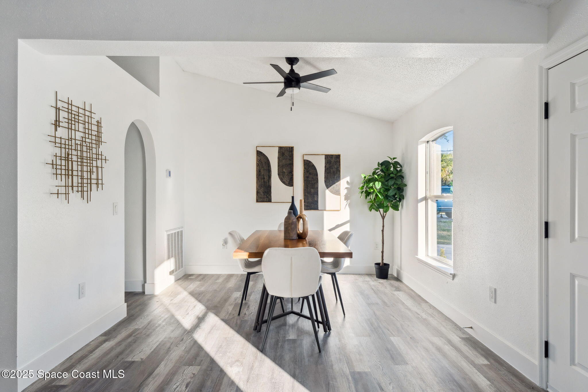 6200 Edison Street Cocoa, FL 32927 - Photo 10 of 21 a dining room with furniture and window