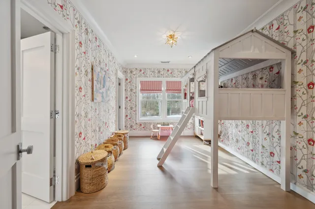 a view of a bedroom with gym equipment