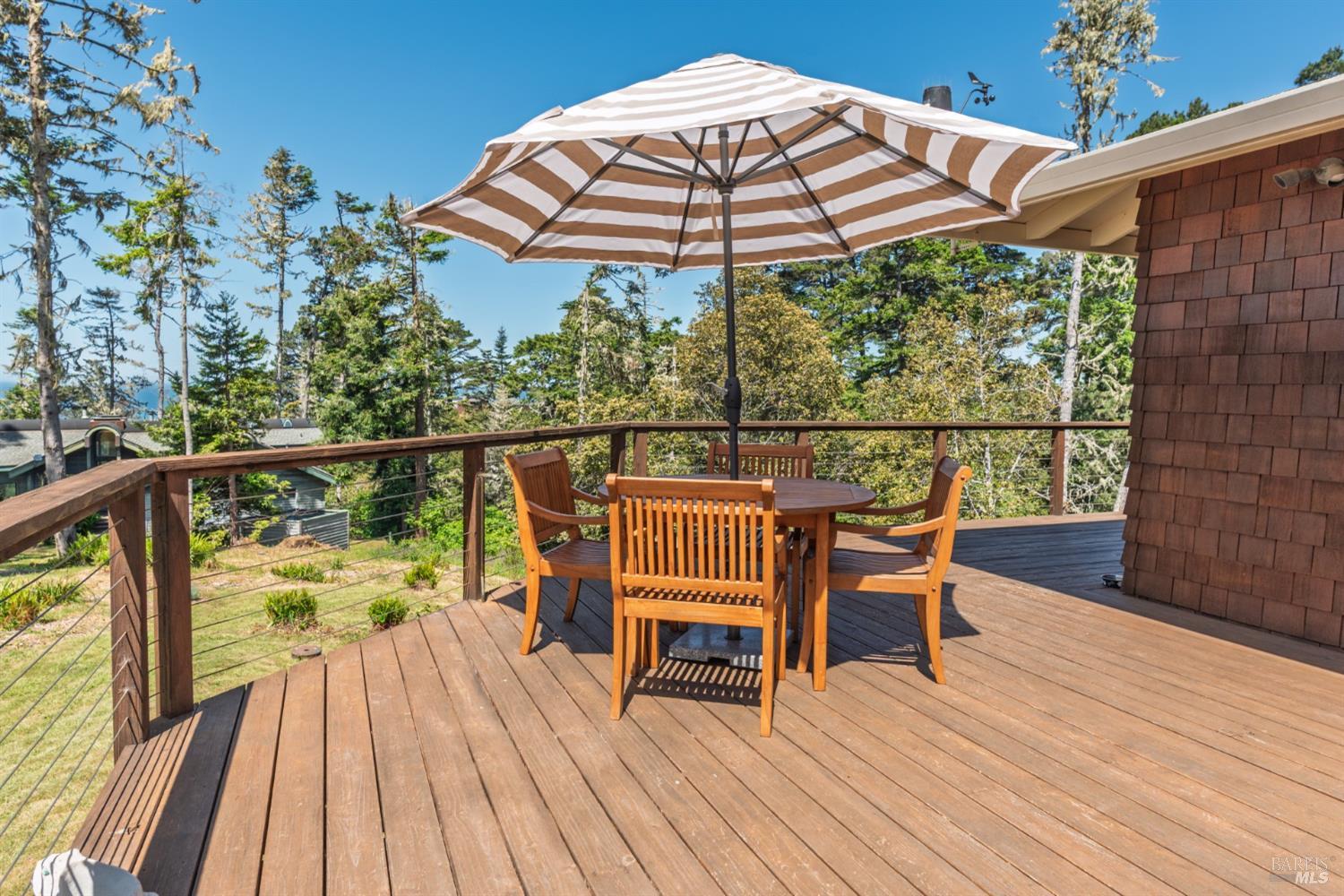 15721 Forest View Road Manchester, CA 95459 - Photo 34 of 50 The wrap-around deck offers many spaces for living, relaxing, entertaining...