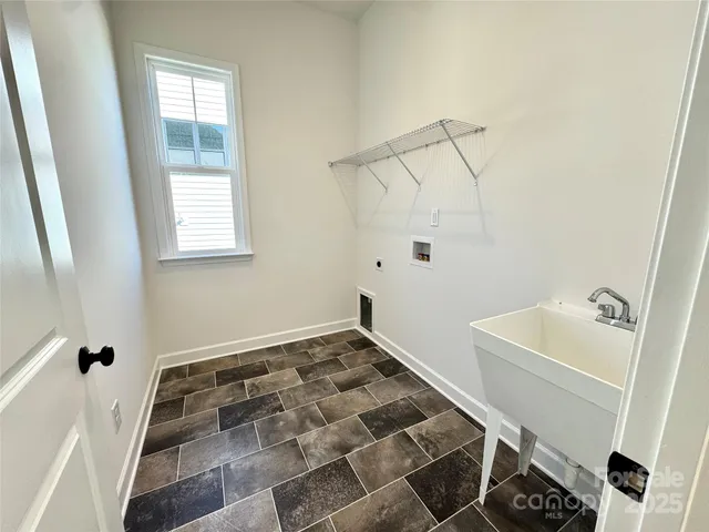 a view of empty room with a window