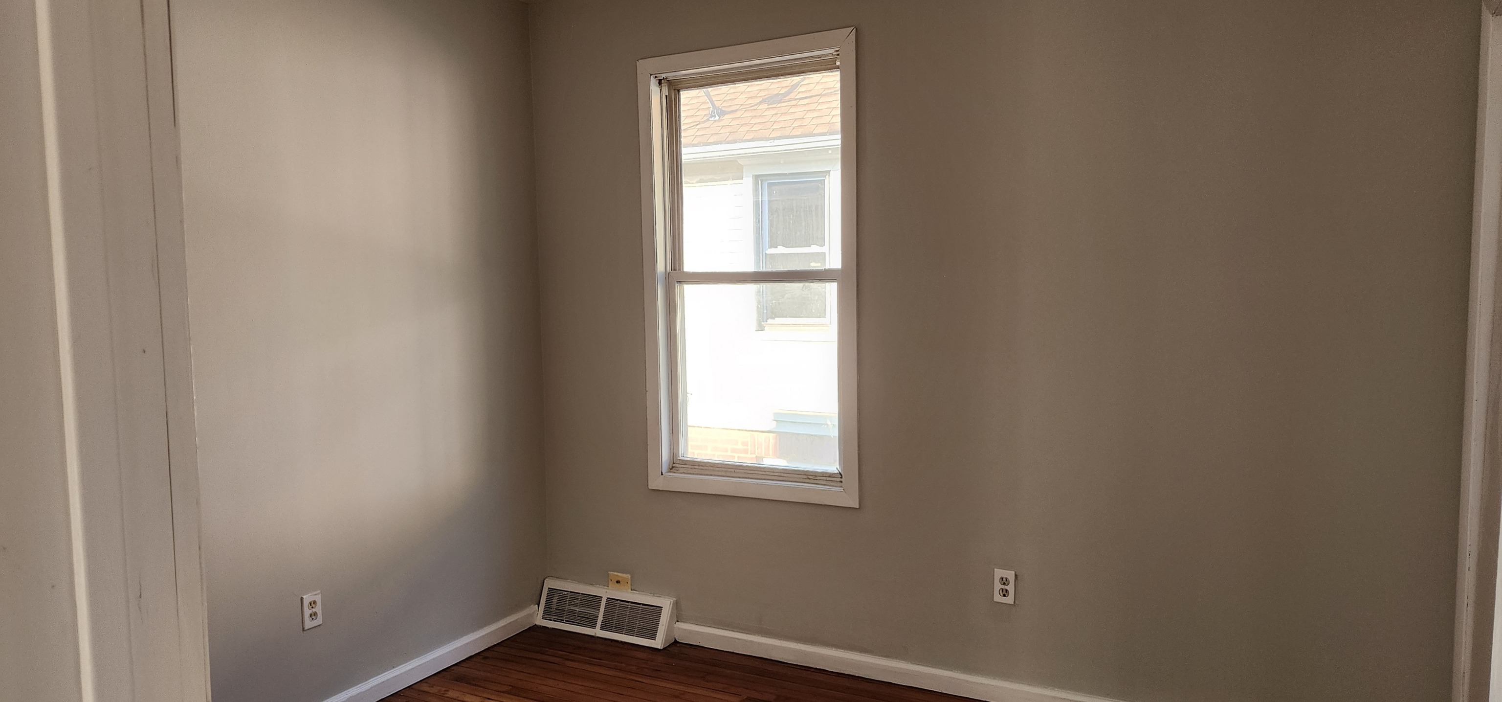 539 Garfield Avenue Bridgeport, CT 06606 - Photo 2 of 7 a view of an empty room with a window