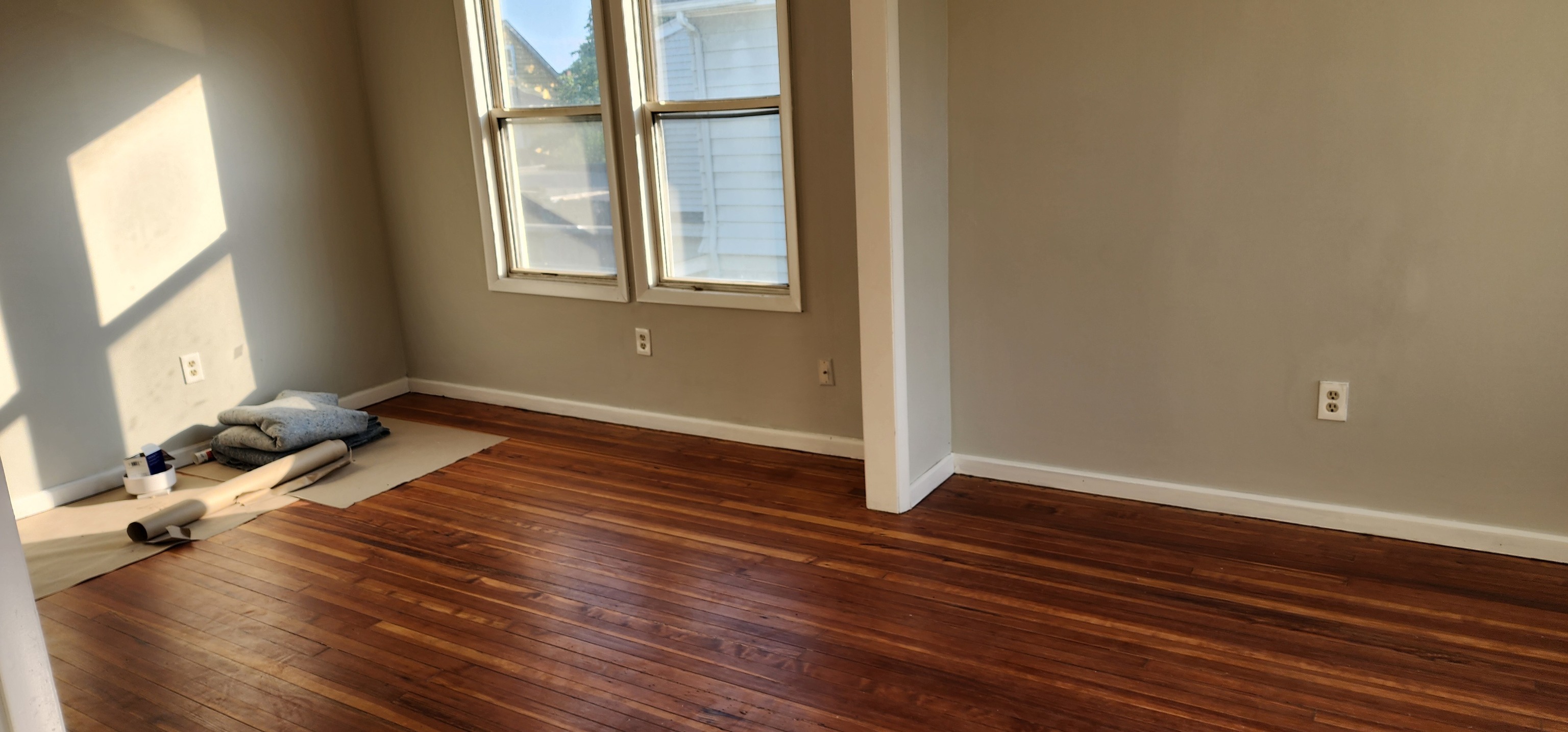 539 Garfield Avenue Bridgeport, CT 06606 - Photo 4 of 7 a view of a room with wooden floor and a window