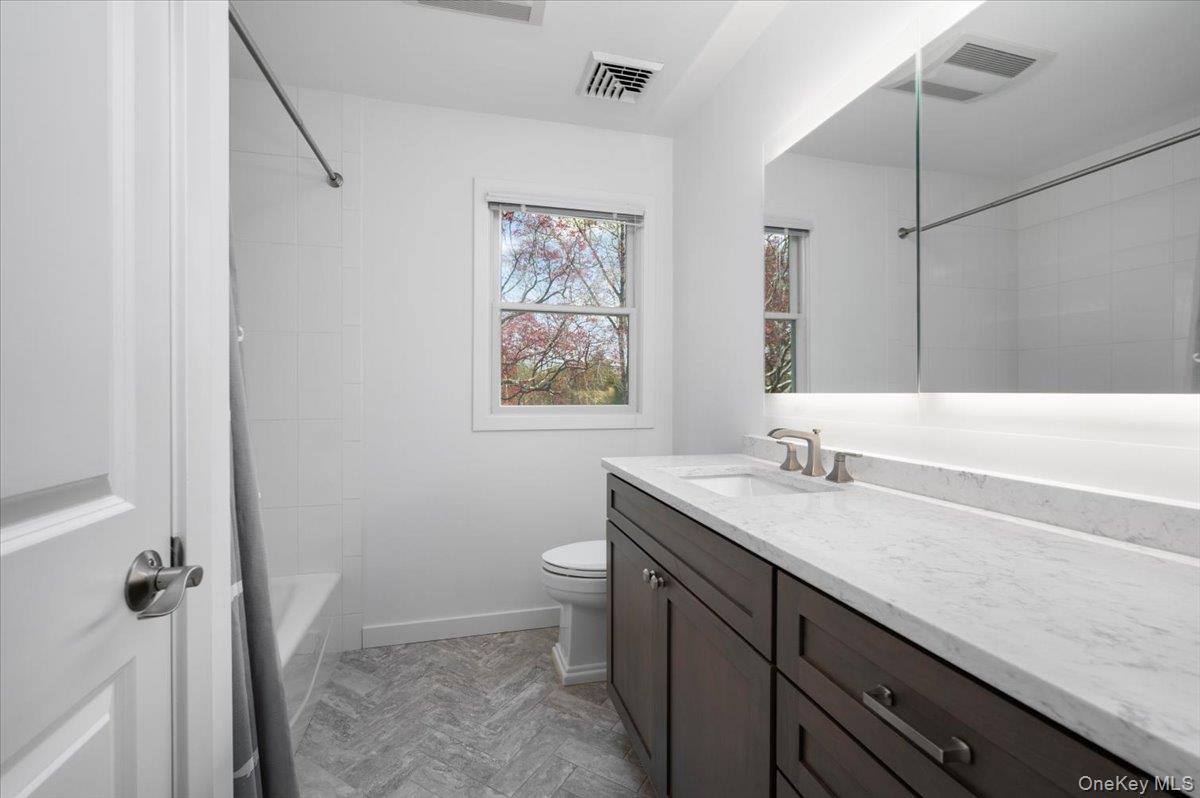 8 Fairlawn Parkway Rye Brook, NY 10573 - Photo 16 of 25 Updated Hall Bathroom