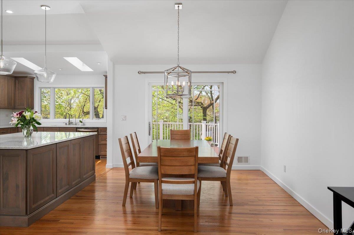 8 Fairlawn Parkway Rye Brook, NY 10573 - Photo 10 of 25 Dining Room with Sliding Glass Door to the Deck