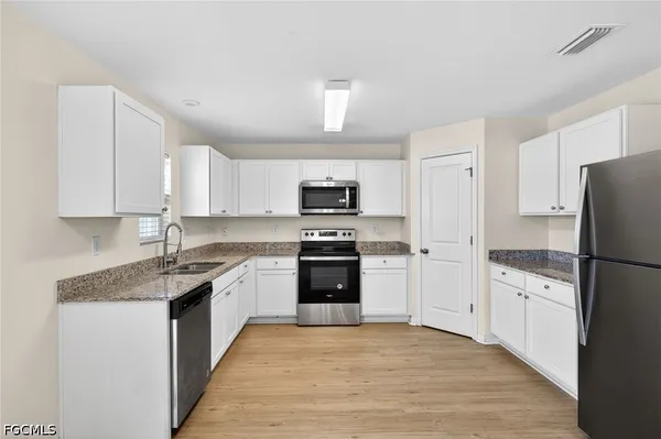 $2,099 | 921 Jacaranda Parkway East, Cape Coral, FL 33909