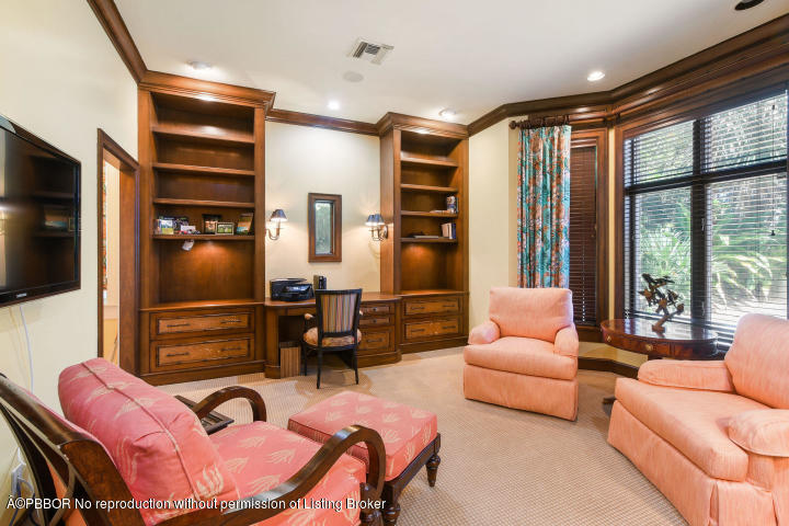 515 South Beach Road Hobe Sound, FL 33455 - Photo 13 of 30 a room with furniture or couch and a flat screen tv