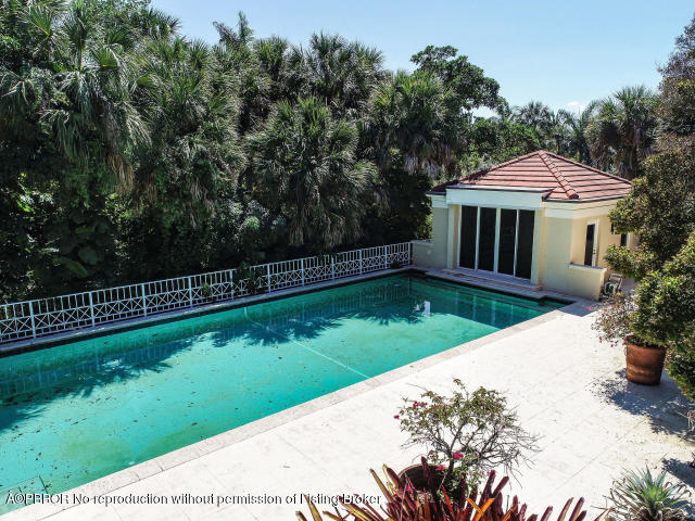 515 South Beach Road Hobe Sound, FL 33455 - Photo 24 of 30 a view of a backyard with a garden