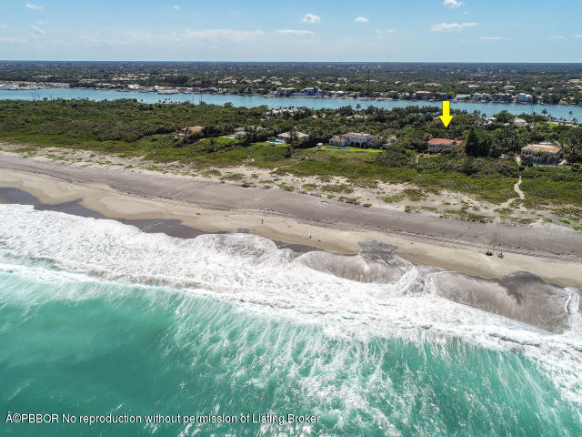 515 South Beach Road Hobe Sound, FL 33455 - Photo 25 of 30 a view of a lake with a city