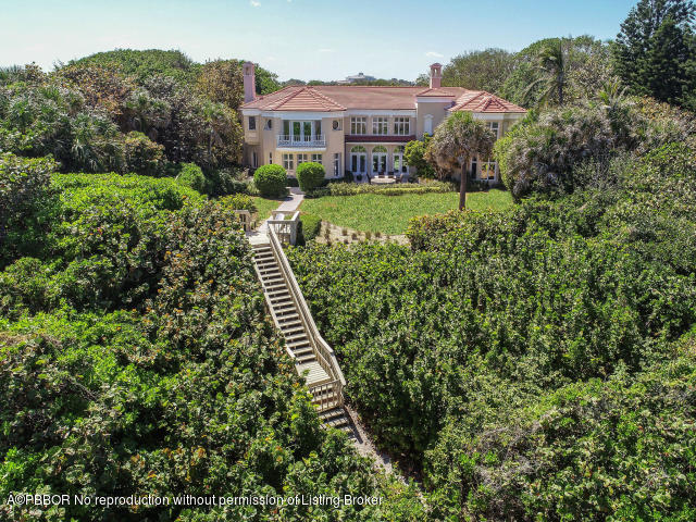 515 South Beach Road Hobe Sound, FL 33455 - Photo 30 of 30 a view of a garden with a house