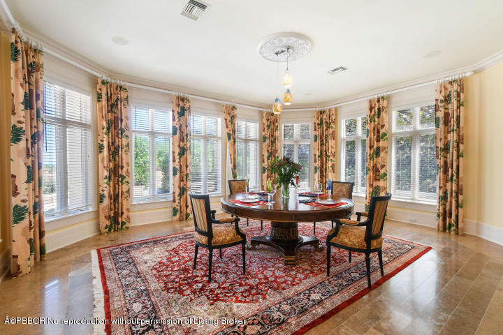 515 South Beach Road Hobe Sound, FL 33455 - Photo 8 of 30 a view of a dining room with furniture window and wooden floor