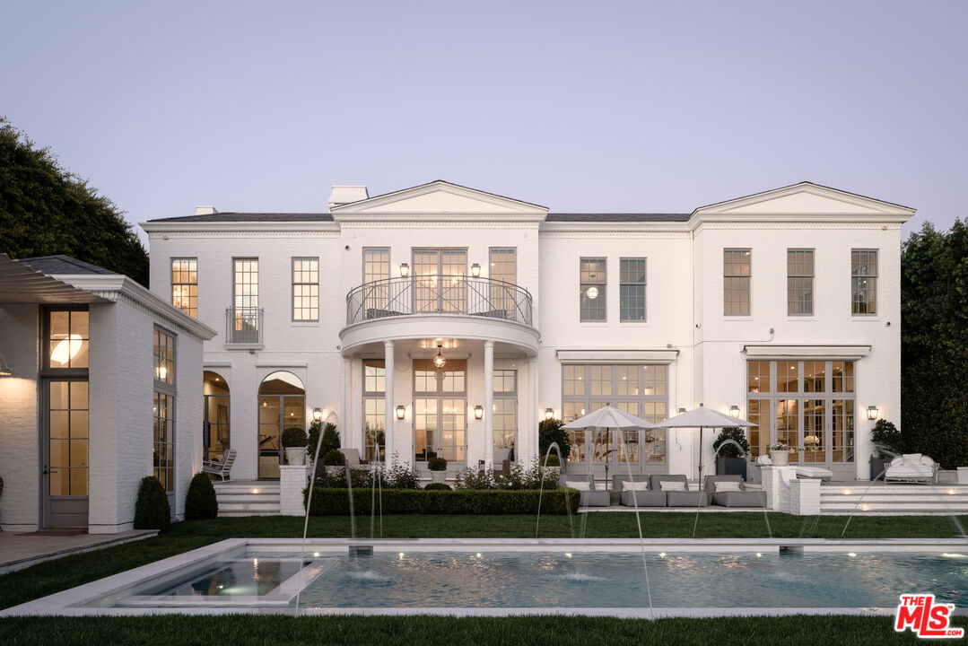 227 North Tigertail Road Los Angeles, CA 90049 - Photo 2 of 42 a front view of a building with street view