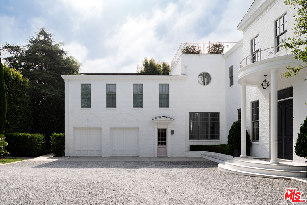 227 North Tigertail Road Los Angeles, CA 90049 - Photo 3 of 42 a view of a white building