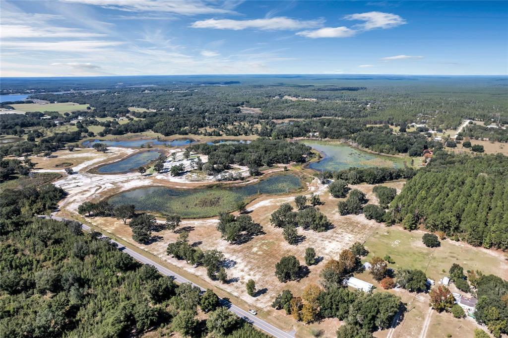 180 Southeast Street Road Umatilla, FL 32784 - Photo 5 of 14 an aerial view of a city