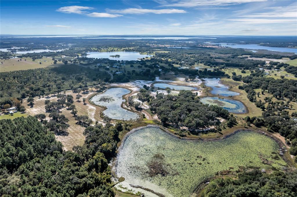 180 Southeast Street Road Umatilla, FL 32784 - Photo 10 of 14 a view of a lake view and mountain view