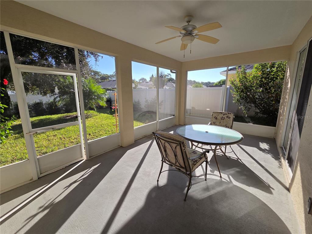 527 Safe Harbor Drive Edgewater, FL 32141 - Photo 26 of 33 a view of a dining room with furniture window and outside view