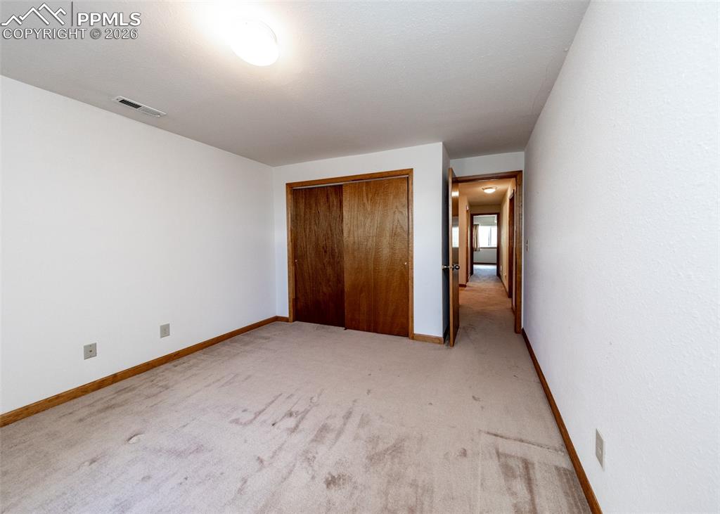 6185 Sayres Road Colorado Springs, CO 80927 - Photo 32 of 50 an empty room with closet