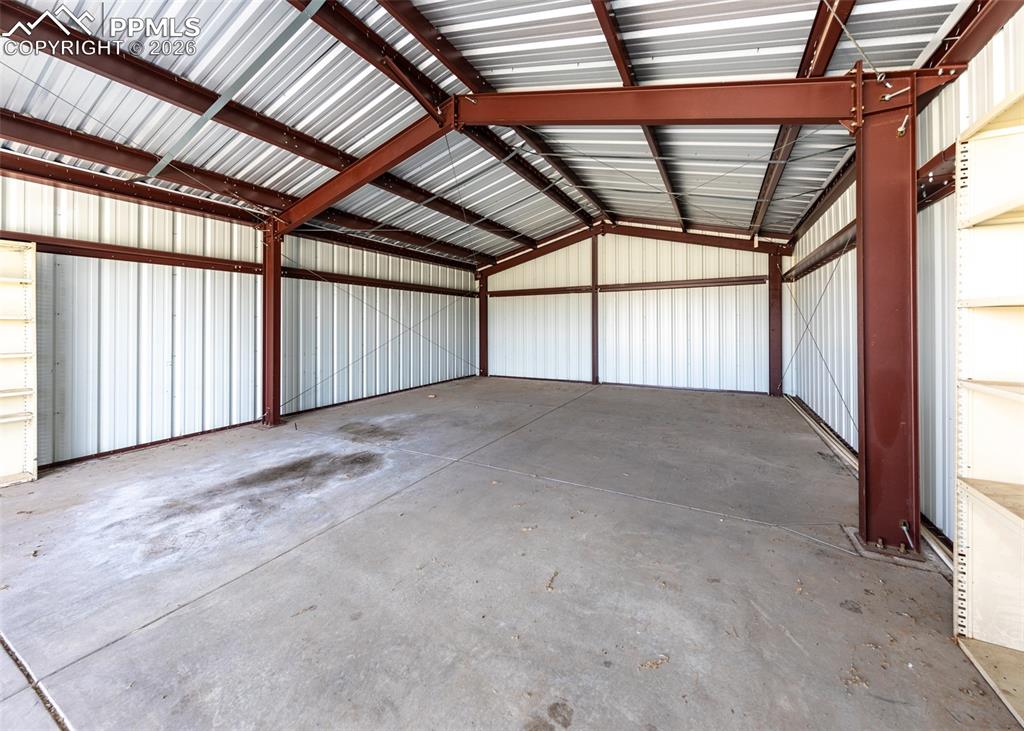6185 Sayres Road Colorado Springs, CO 80927 - Photo 40 of 50 a view of an empty room with a sliding door