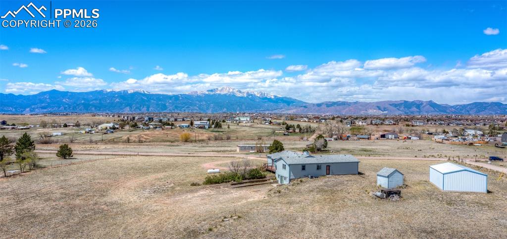 6185 Sayres Road Colorado Springs, CO 80927 - Photo 43 of 50 a view of a terrace with lawn chairs