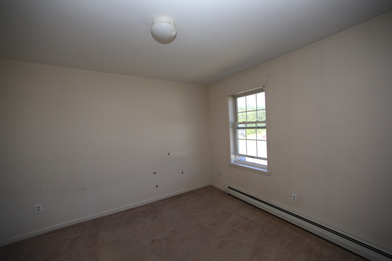 48 Colonial Road, Unit 102 Fairfax, VT 05454 - Photo 15 of 24