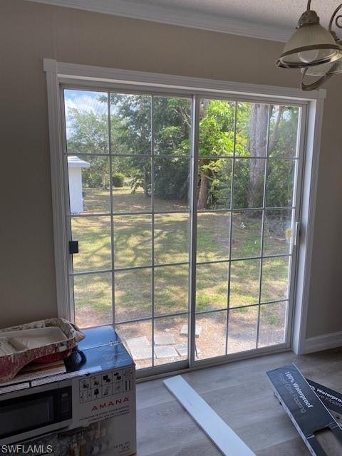 158 Rookery Road Naples, FL 34114 - Photo 11 of 26 a living room with a large window