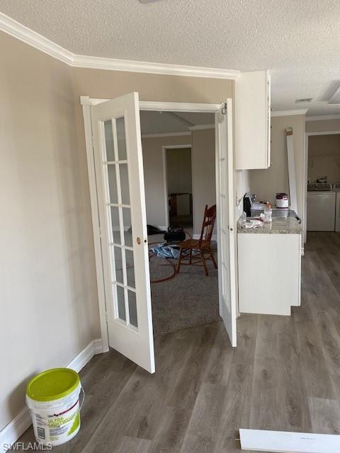 158 Rookery Road Naples, FL 34114 - Photo 17 of 26 a view of a kitchen with fridge and wooden floor