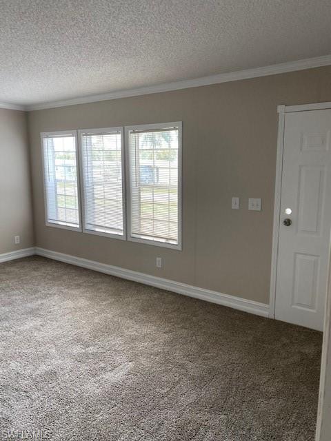 158 Rookery Road Naples, FL 34114 - Photo 20 of 26 an empty room with windows