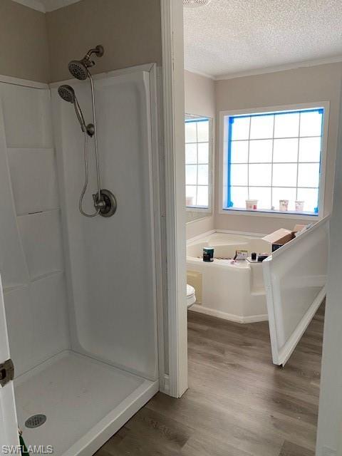 158 Rookery Road Naples, FL 34114 - Photo 22 of 26 a bathroom with a tub shower and a window