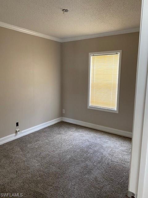 158 Rookery Road Naples, FL 34114 - Photo 26 of 26 an empty room with a window