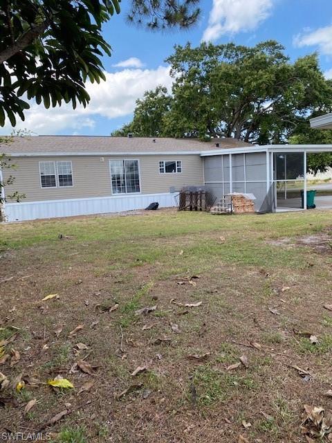 158 Rookery Road Naples, FL 34114 - Photo 3 of 26 a house view with a backyard space