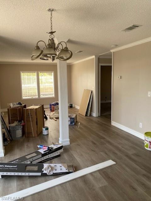 158 Rookery Road Naples, FL 34114 - Photo 10 of 26 a room with gym equipment and a wooden floor